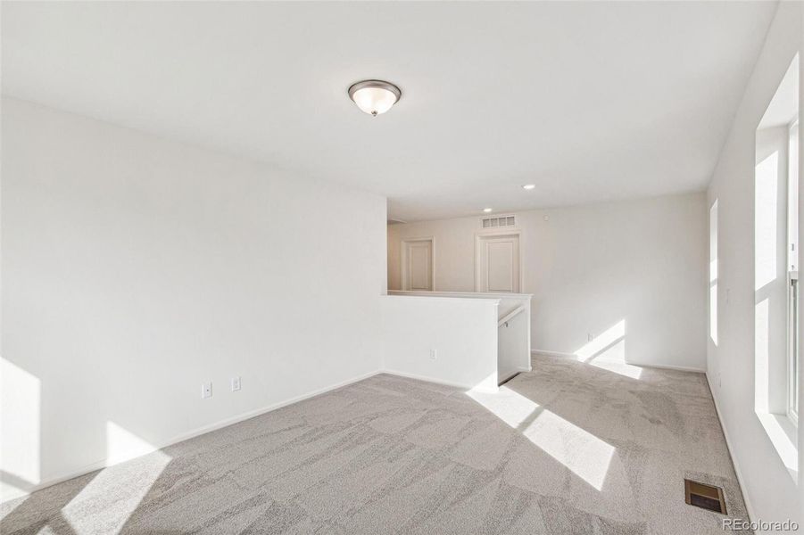 Spacious, unfurnished interior of a new home in Turnberry, Commerce City (Image 23).