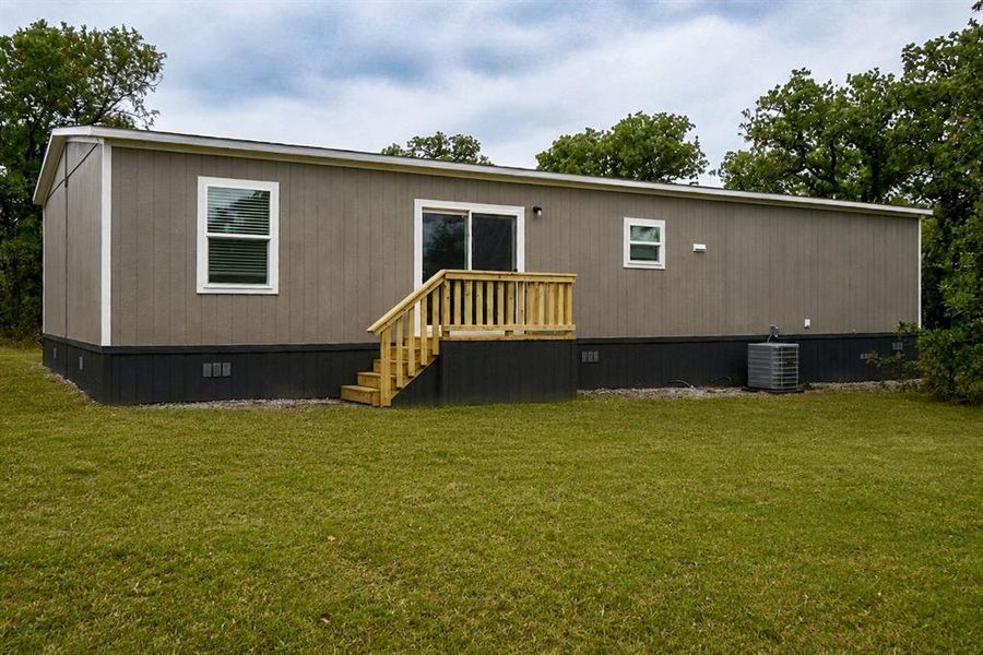 Exterior details and patio area of a home in , Runaway Bay (Image 26).