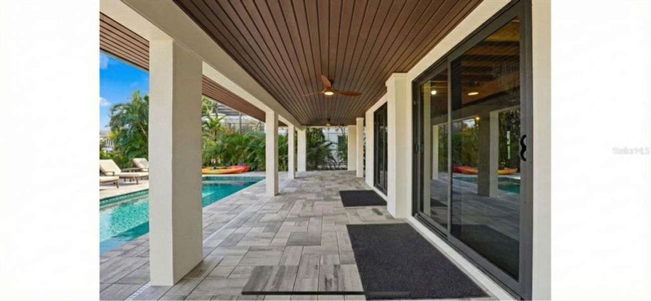 Exterior details and patio area of a home in , Englewood (Image 39).