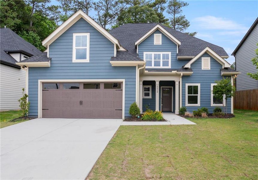 Front exterior of a new home in , Decatur, GA, highlighting curb appeal (Image 12).