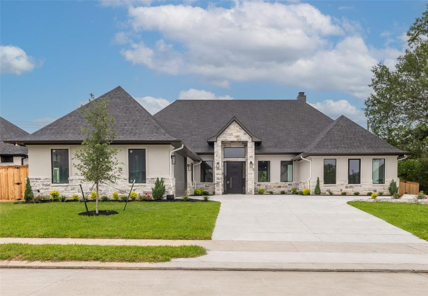 Front exterior of a new home in , College Station, TX, highlighting curb appeal (Image 26).