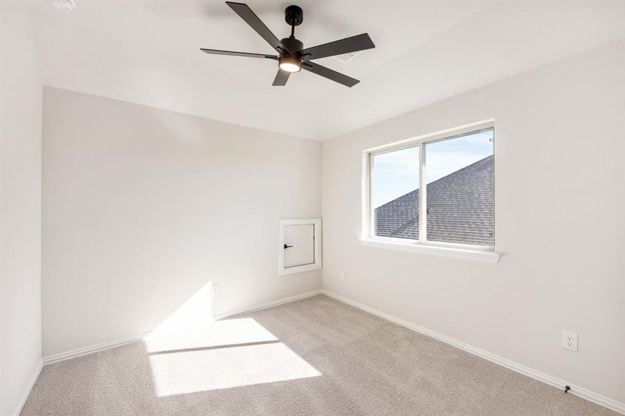 Spacious, unfurnished interior of a new home in The Retreat at North Grove 60, Waxahachie (Image 20).