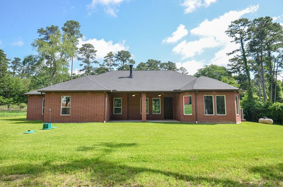 Exterior details and patio area of a home in , Plantersville (Image 26).