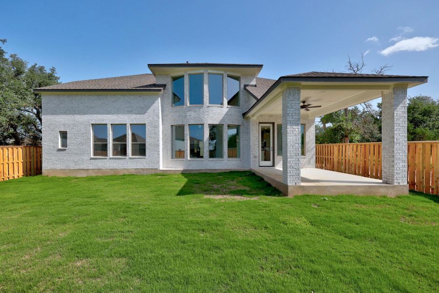 Front exterior of a new home in Parmer Ranch - 60', Georgetown, TX, highlighting curb appeal (Image 1).