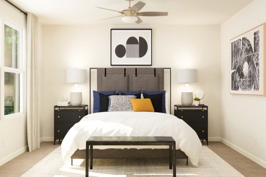 A bedroom with a bed and lamps. A bedroom with a bed and lamps.