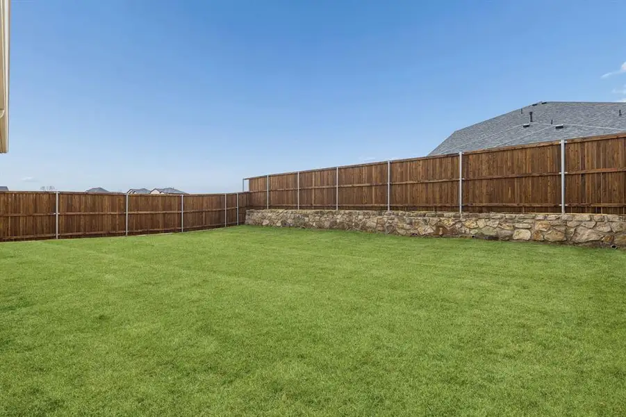 Exterior details and patio area of a home in Venetian, Weston (Image 3).