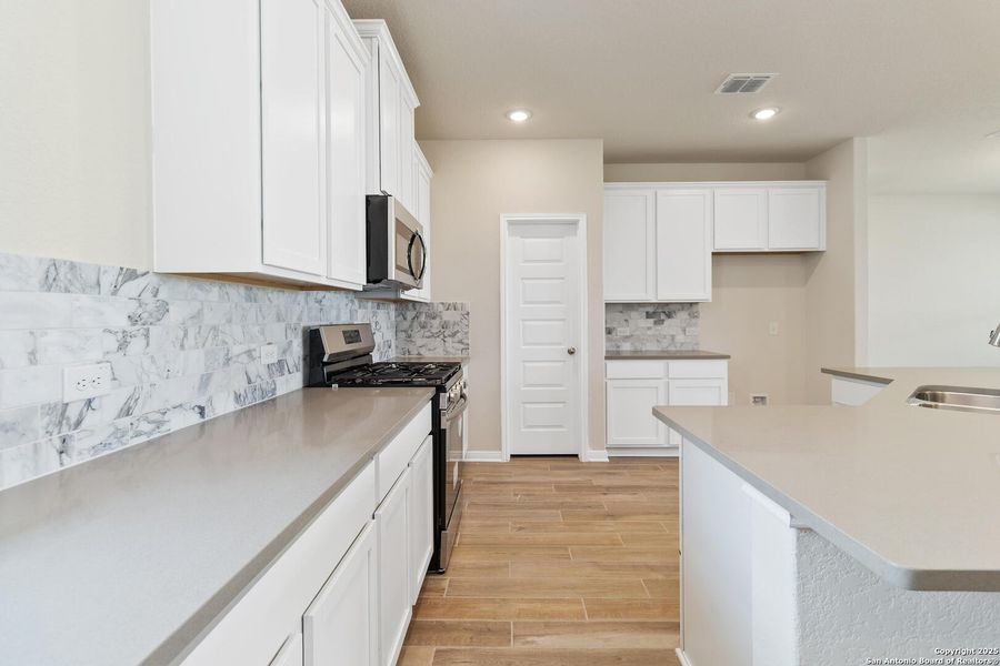 Furnished interior view inside a new home in Lonesome Dove, San Antonio (Image 5).