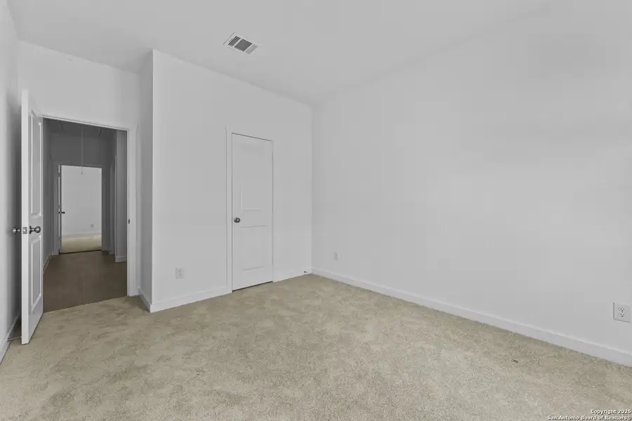 Spacious, unfurnished interior of a new home in Waterwheel: Coastline Collection, San Antonio (Image 11).