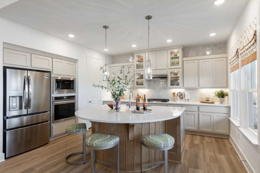 Representative furnished interior of a home built from the Monet-SS by Highland Homes in Lariat, Liberty Hill (Image 9).