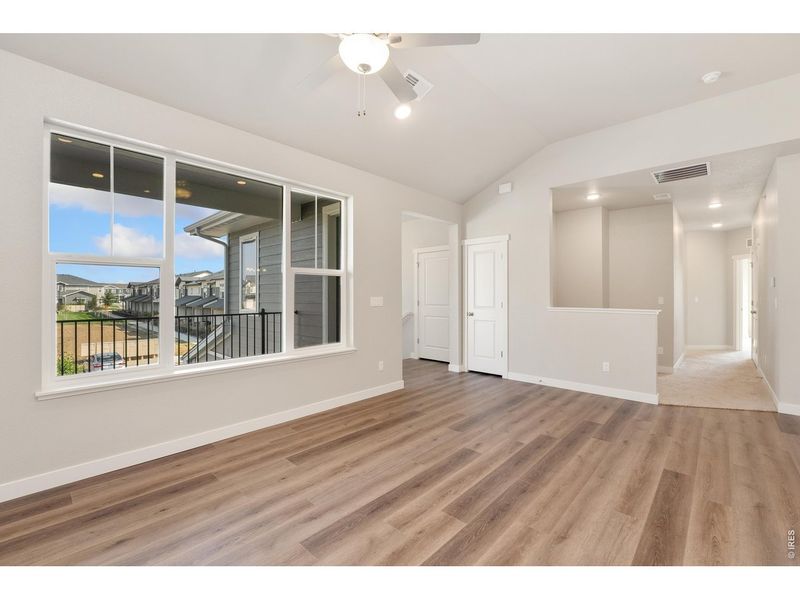 Spacious, unfurnished interior of a new home in The Lakes at Centerra - Discovery, Loveland (Image 19).