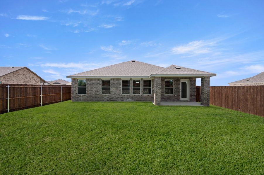 Front exterior of a new home in Baker Farms, Cleburne, TX, highlighting curb appeal (Image 25). Front exterior of a new home in Baker Farms, Cleburne, TX, highlighting curb appeal (Image 25).