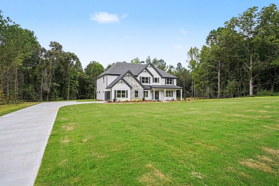 Front exterior of a new home in Flint Farms, Concord, GA, highlighting curb appeal (Image 27).