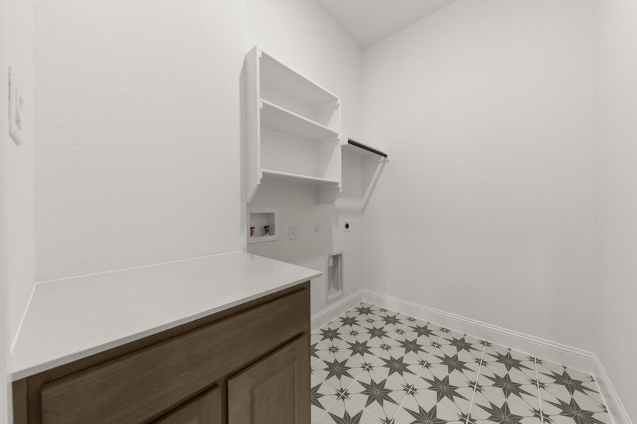 Furnished interior view inside a new home in The Reserve at Spiritas Ranch, Little Elm (Image 14).