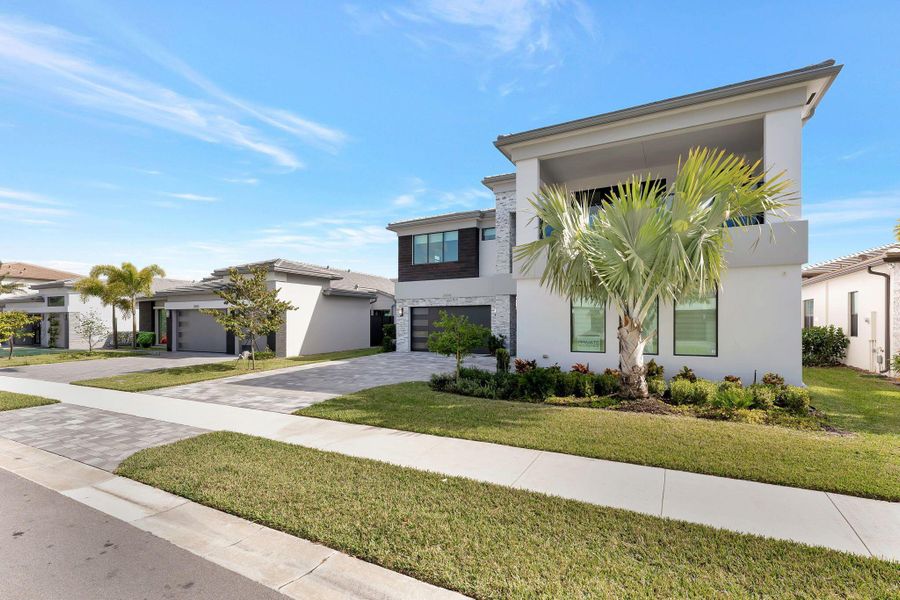 Front exterior of a new home in , Boca Raton, FL, highlighting curb appeal (Image 25). Front exterior of a new home in , Boca Raton, FL, highlighting curb appeal (Image 25).