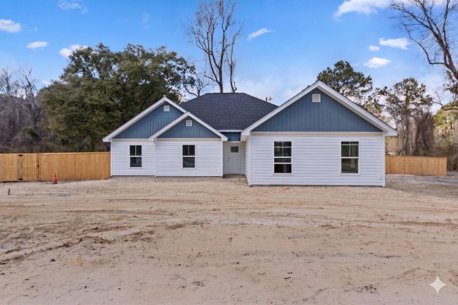 Exterior details and patio area of a home in , Awendaw (Image 7).