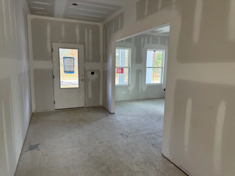 Foyer featuring the AW Collection® Artisan - A natural welcome with relaxed textures and grounded design.