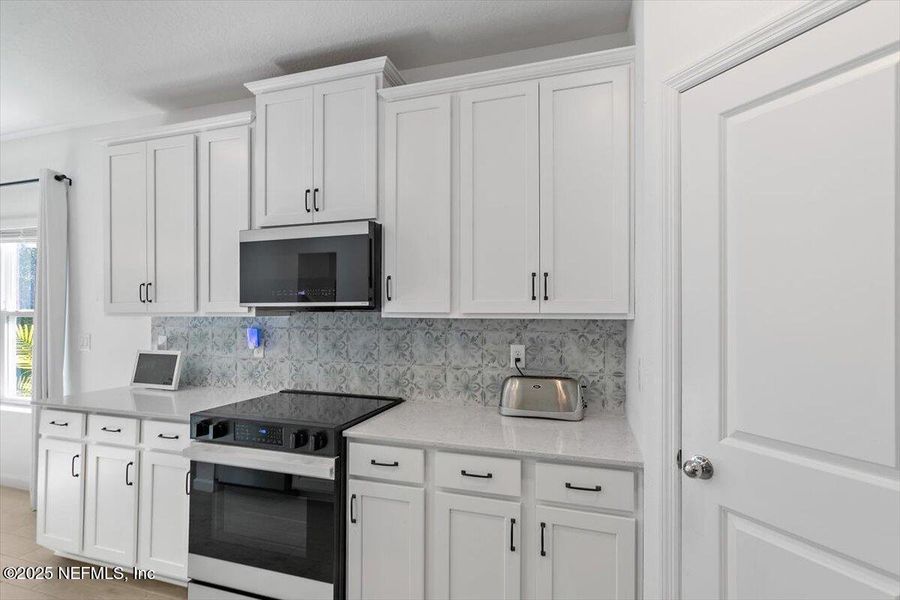 Furnished interior view inside a new home in St Augustine Lakes, St. Augustine (Image 18).