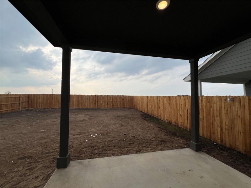 Exterior details and patio area of a home in Rolling Glen, Hutto (Image 18).