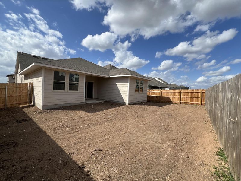 Exterior details and patio area of a home in Rolling Glen, Hutto (Image 3).