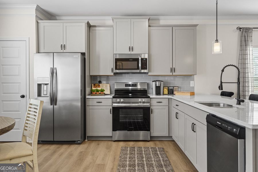 Furnished interior view inside a new home in Crescent Towns, Riverdale (Image 9).