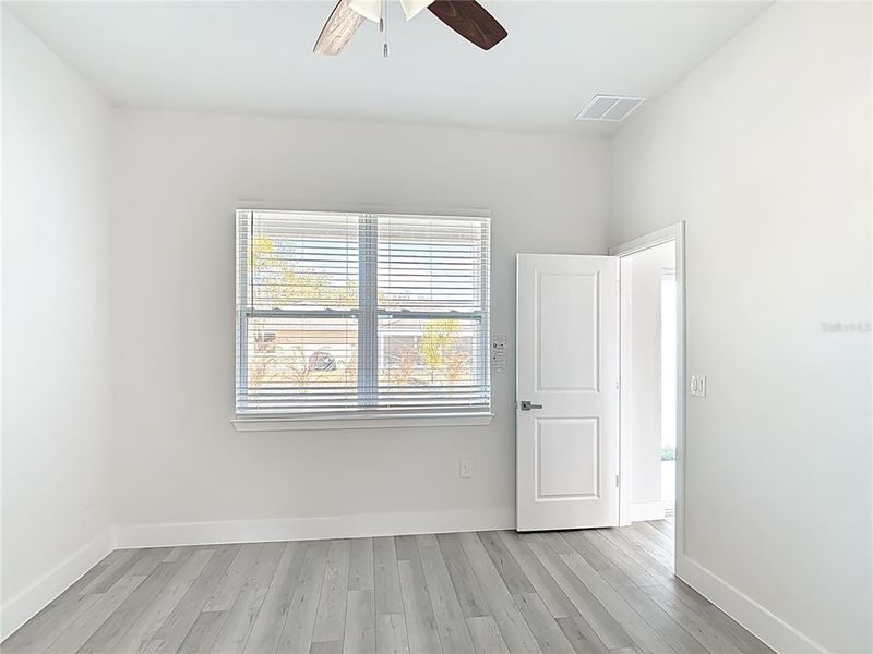 Spacious, unfurnished interior of a new home in , Port Charlotte (Image 36).