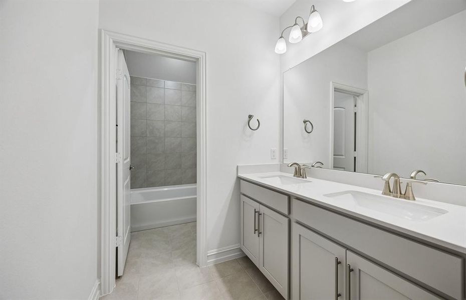 Secondary bathroom with double vanity