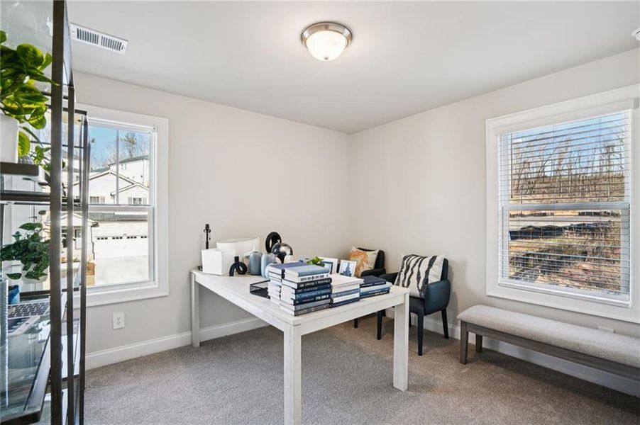 Furnished interior view inside a new home in Hemingway - Reserve Series, Cumming (Image 12). Furnished interior view inside a new home in Hemingway - Reserve Series, Cumming (Image 12).
