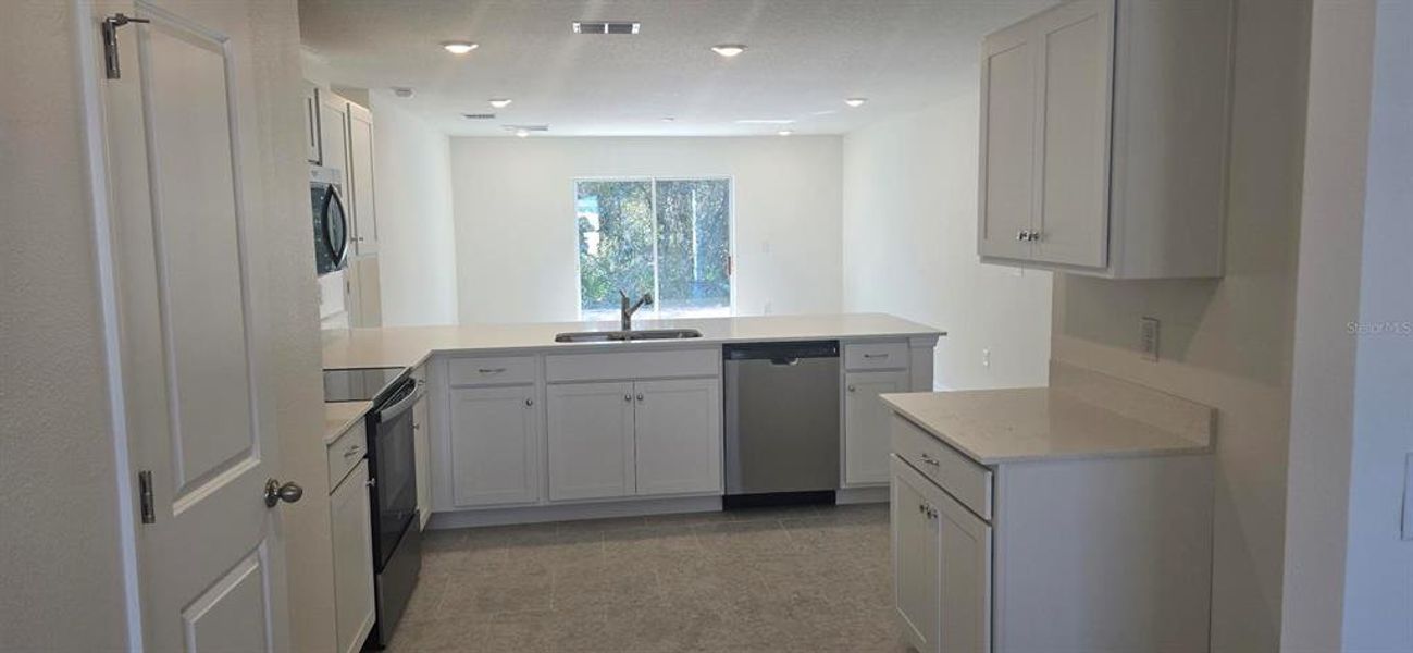 Furnished interior view inside a new home in , Poinciana (Image 7). Furnished interior view inside a new home in , Poinciana (Image 7).