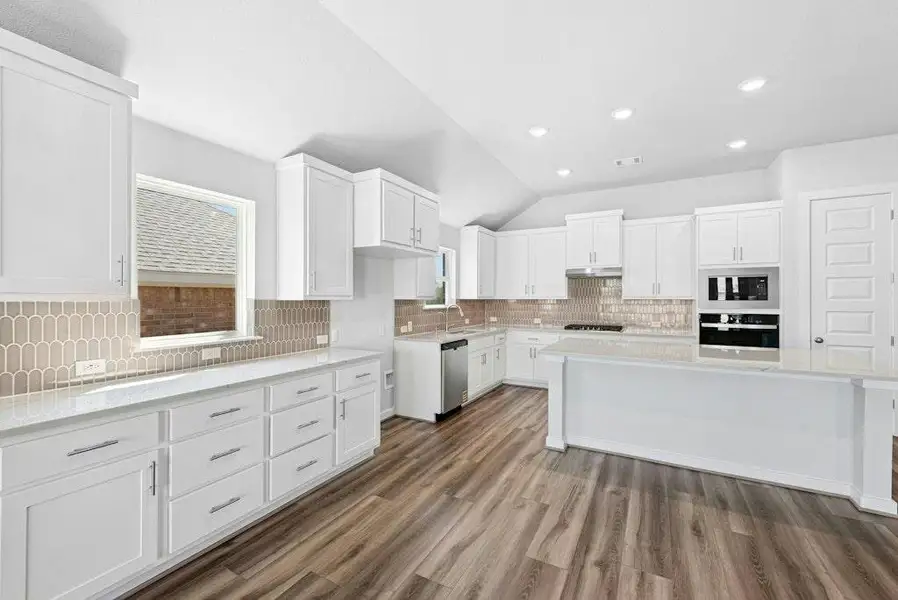 Furnished interior view inside a new home in The Colony, Bastrop (Image 9). Furnished interior view inside a new home in The Colony, Bastrop (Image 9).