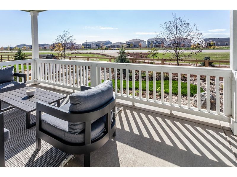 Exterior details and patio area of a home in Trailside Story Collection - Single Family Homes, Timnath (Image 23).
