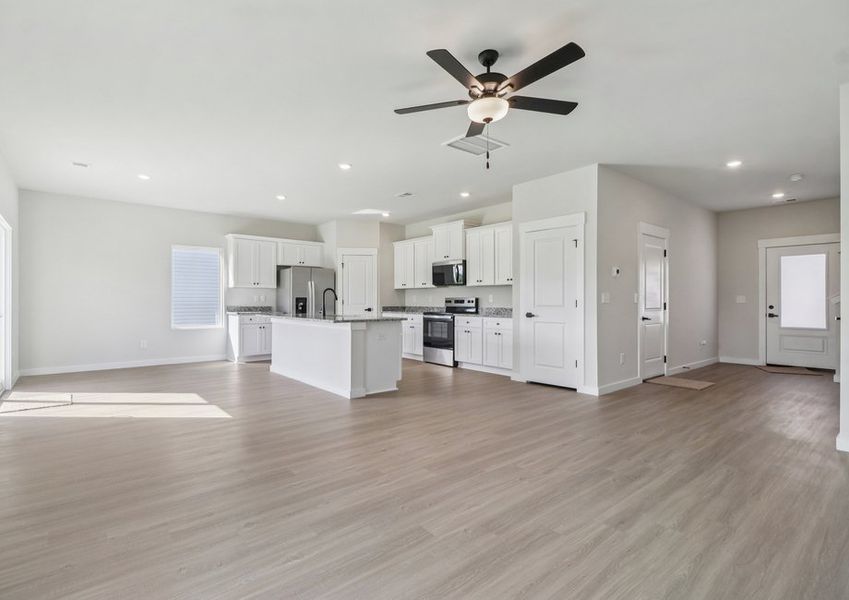 The kitchen is open to the living area The kitchen is open to the living area