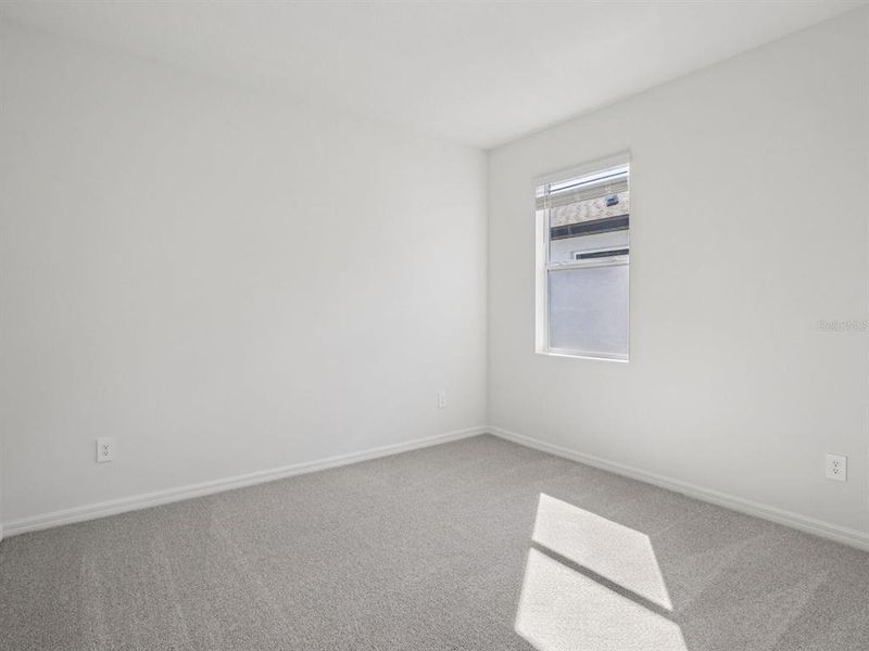 Spacious, unfurnished interior of a new home in Coasterra - Reserve Series, Palmetto (Image 19).