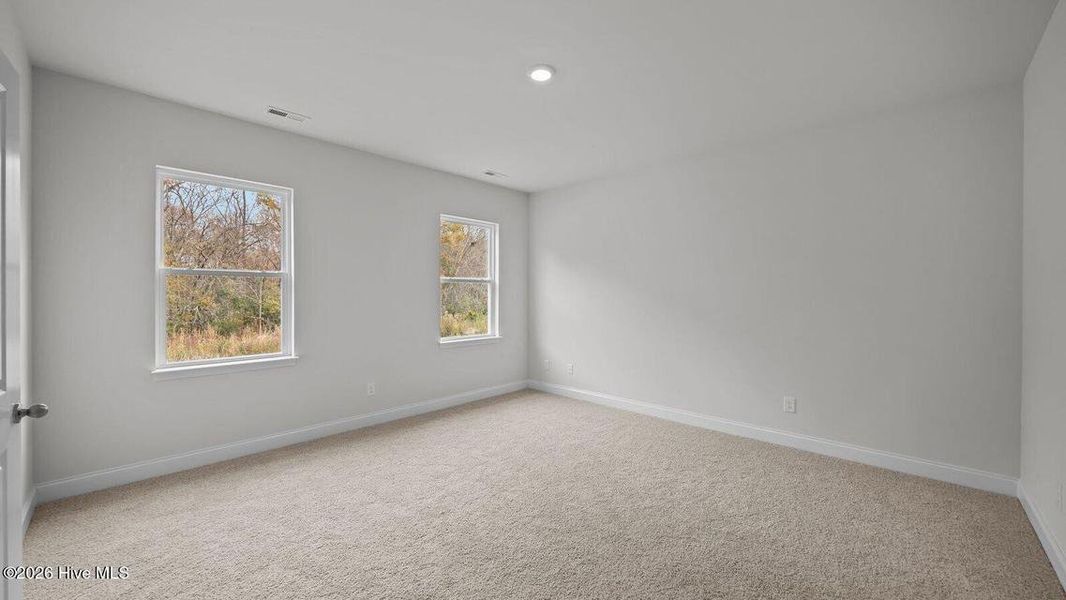 Spacious, unfurnished interior of a new home in Villa Grande, Winterville (Image 24).
