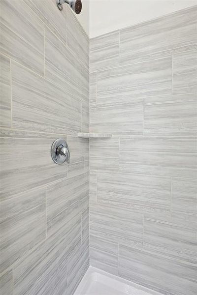 Bathroom with a tile shower