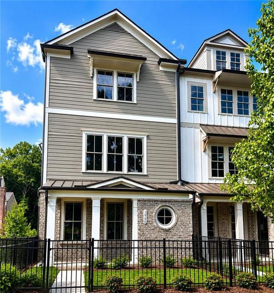 Front exterior of a new home in Devin's Shire, Kennesaw, GA, highlighting curb appeal (Image 22).