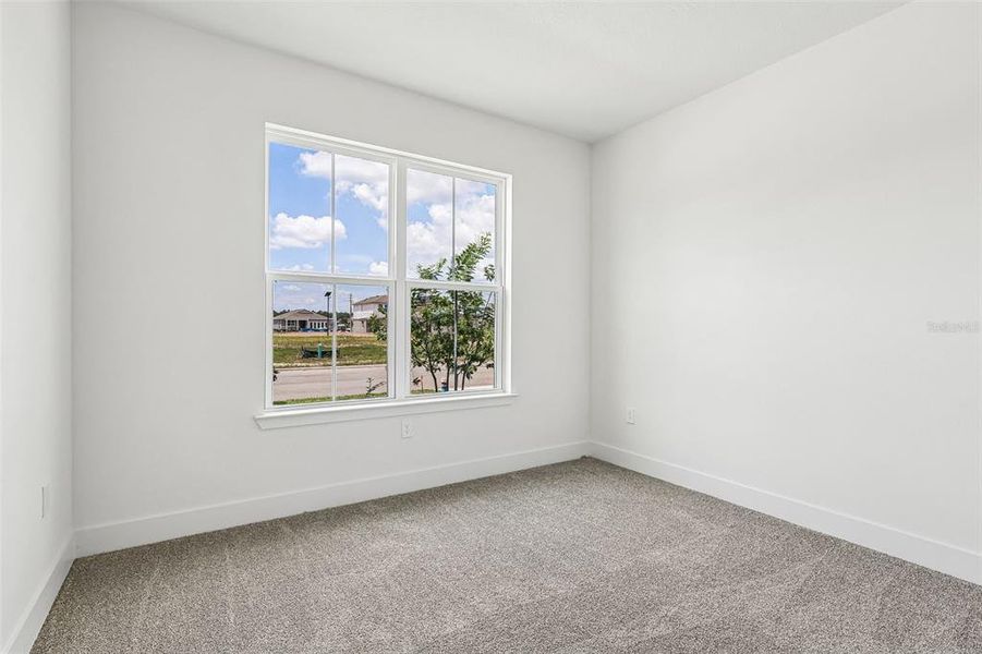 Spacious, unfurnished interior of a new home in Lakeside at Satilla, St. Cloud (Image 30).