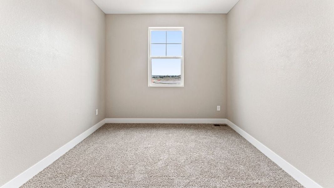 Representative unfurnished interior of a home built from the Pike by Taylor Morrison in The Aurora Highlands Town Collection, Aurora (Image 32).