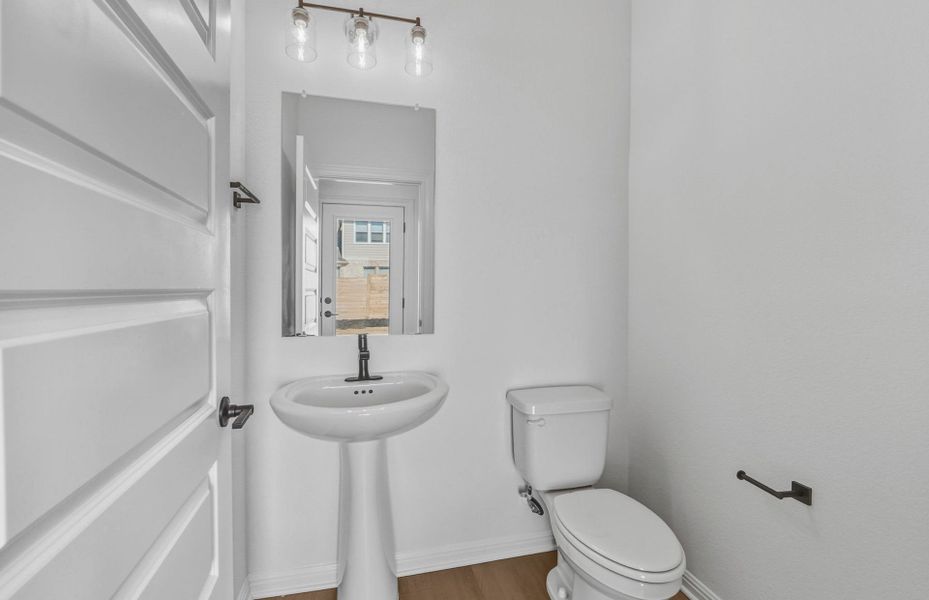 Furnished interior view inside a new home in Bluffview Reserve, Leander (Image 14).