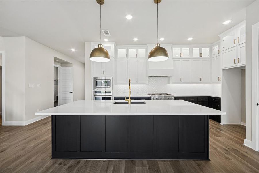 Furnished interior view inside a new home in Pecan Square - Estates, Northlake (Image 8). Furnished interior view inside a new home in Pecan Square - Estates, Northlake (Image 8).