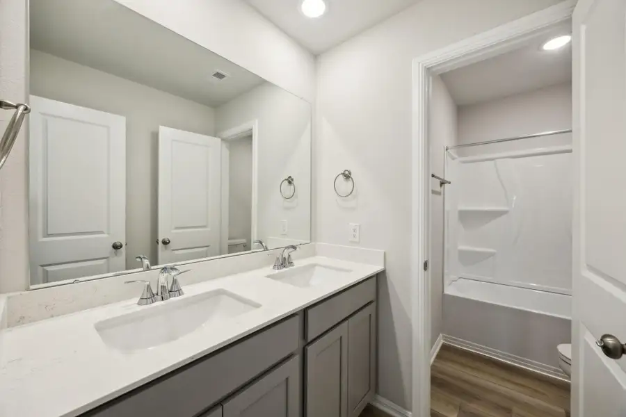 Furnished interior view inside a new home in Saint Tropez, Houston (Image 2).