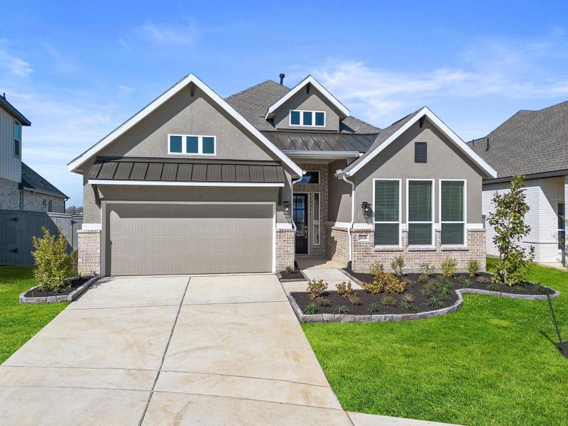 Front exterior of a new home in , New Caney, TX, highlighting curb appeal (Image 2). Front exterior of a new home in , New Caney, TX, highlighting curb appeal (Image 2).
