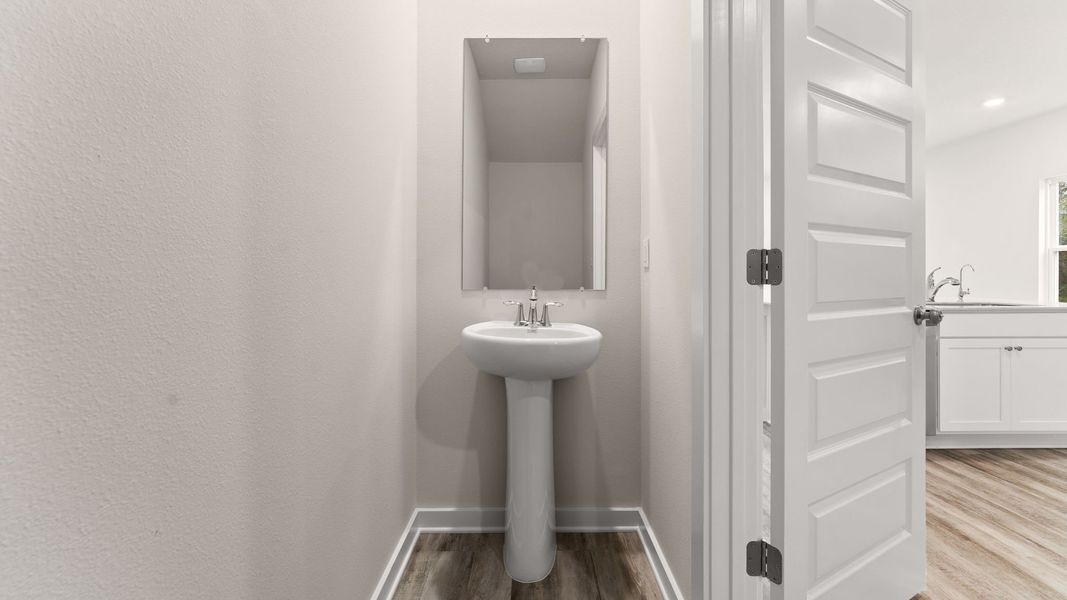 Furnished interior view inside a new home in Genoa Landing Townhomes, Freeport (Image 11).