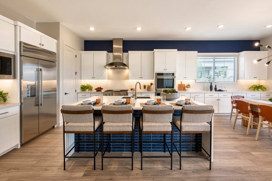 Representative furnished interior of a home built from the Tipton Plan 3507 by Tri Pointe Homes in Waterston Central, Gilbert (Image 6).