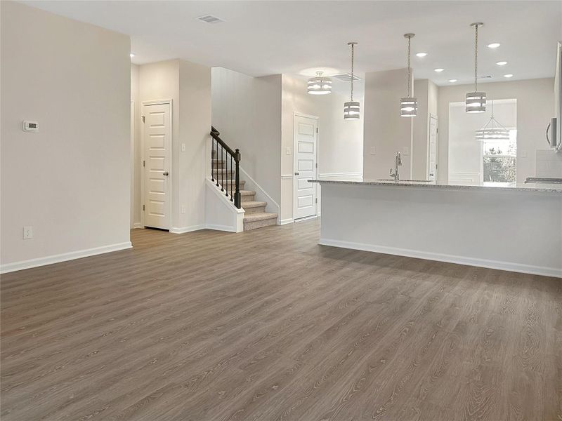 The Caldwell- Family Room. Home is under construction. Sample image for illustration; upgrades, options, and colors may vary.