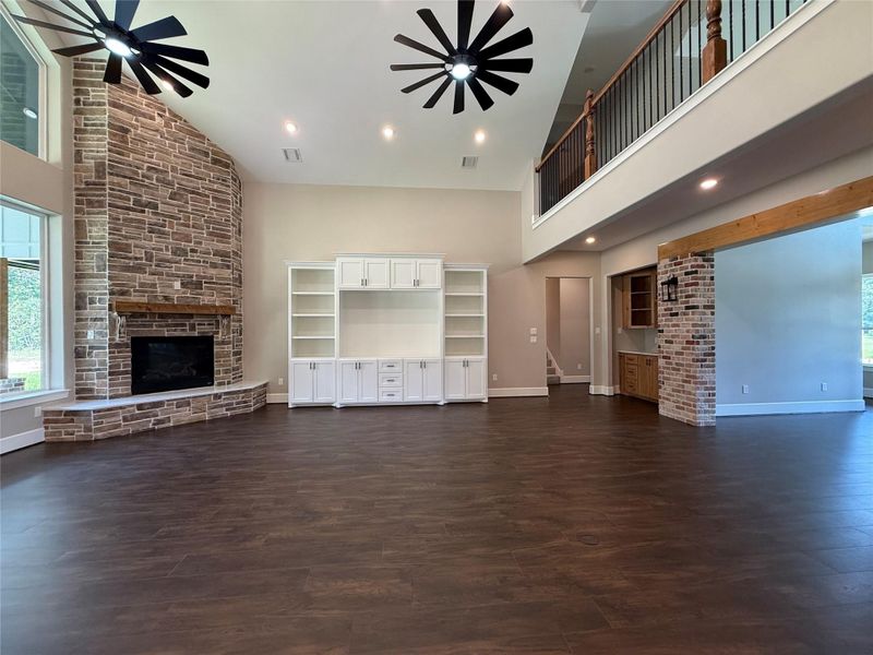 Living room with floor plugs and built in entertainment center Living room with floor plugs and built in entertainment center