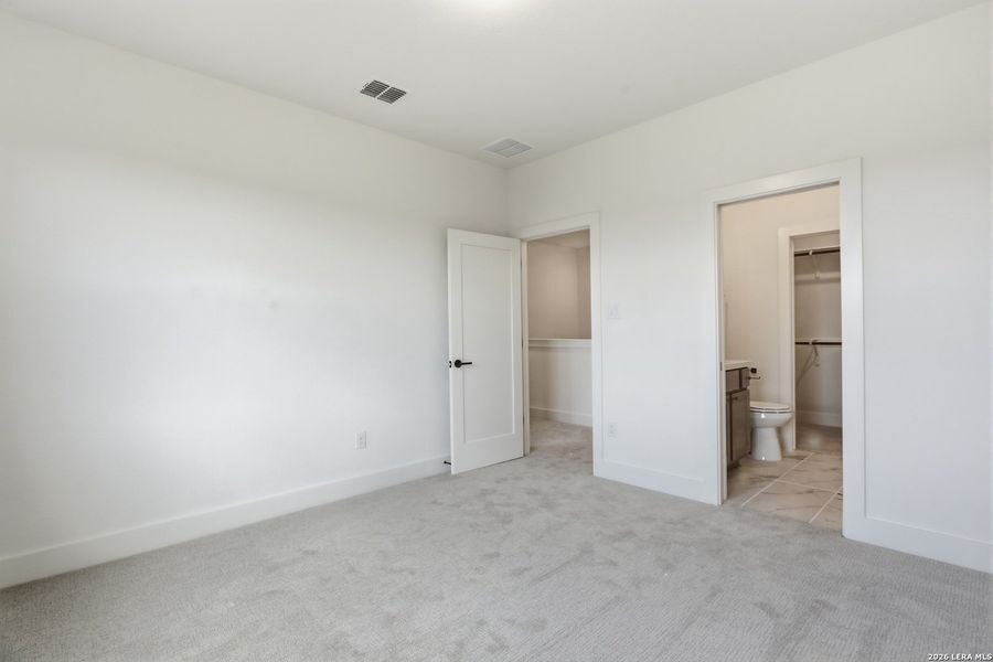 Spacious, unfurnished interior of a new home in Enchanted Bluff, San Antonio (Image 24).