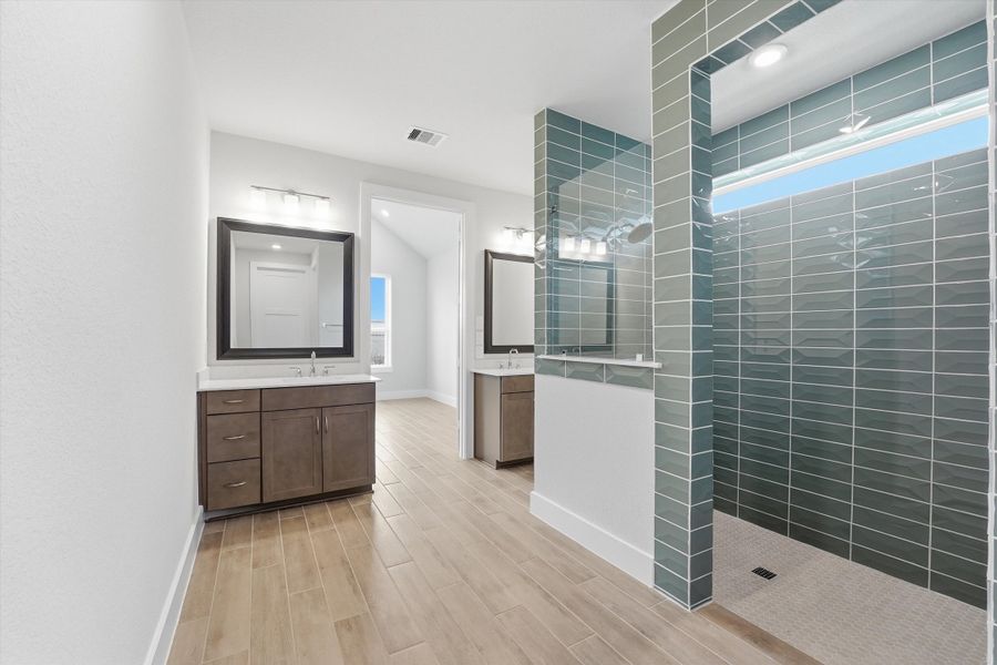 Furnished interior view inside a new home in Bridgeland, Cypress (Image 7).