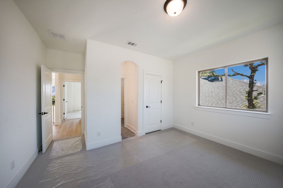 Representative unfurnished interior of a home built from the The Travis by Whitestone Custom Homes in Johnson Ranch, Bulverde (Image 57).