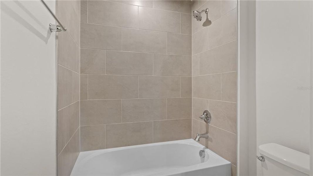 Furnished interior view inside a new home in Grasslands West, Lakeland (Image 10). Furnished interior view inside a new home in Grasslands West, Lakeland (Image 10).