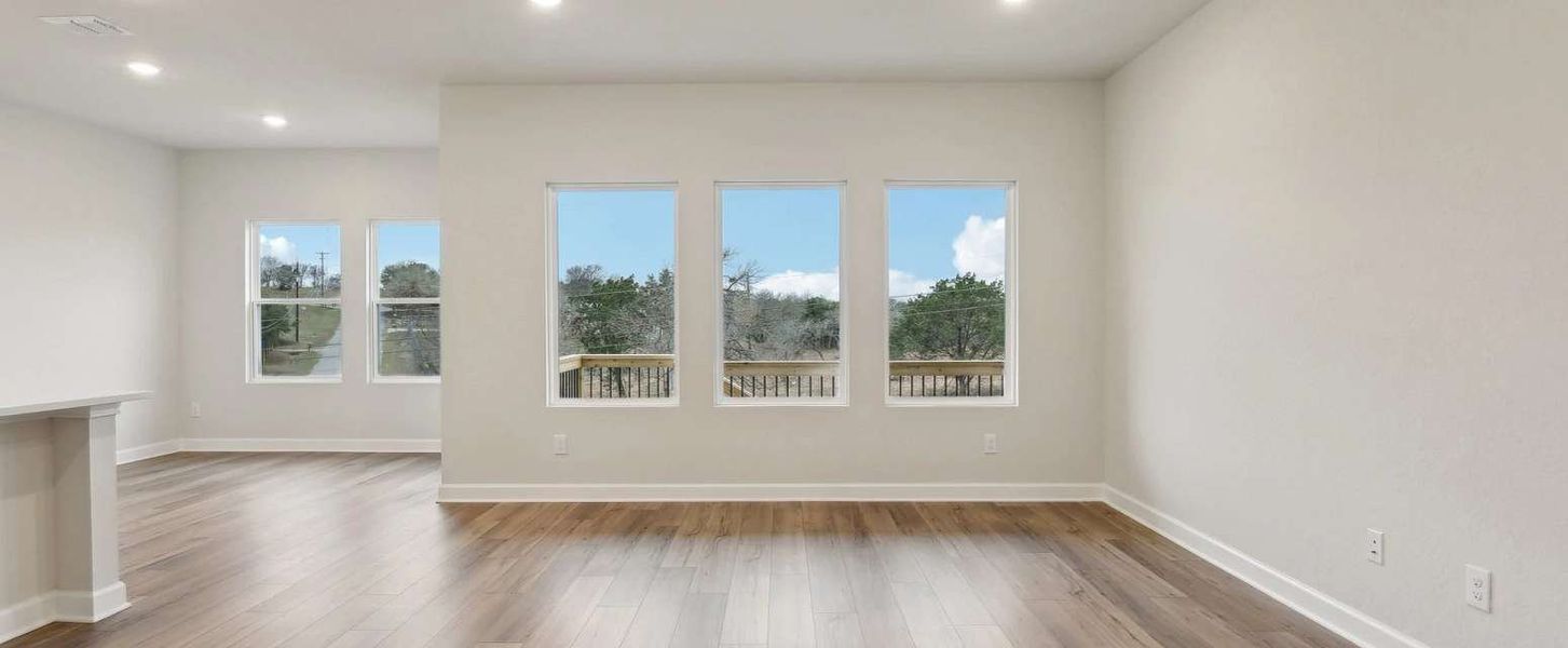 Representative unfurnished interior of a home built from the Makenzie by Ashton Woods in Hennersby Hollow, San Antonio (Image 13).